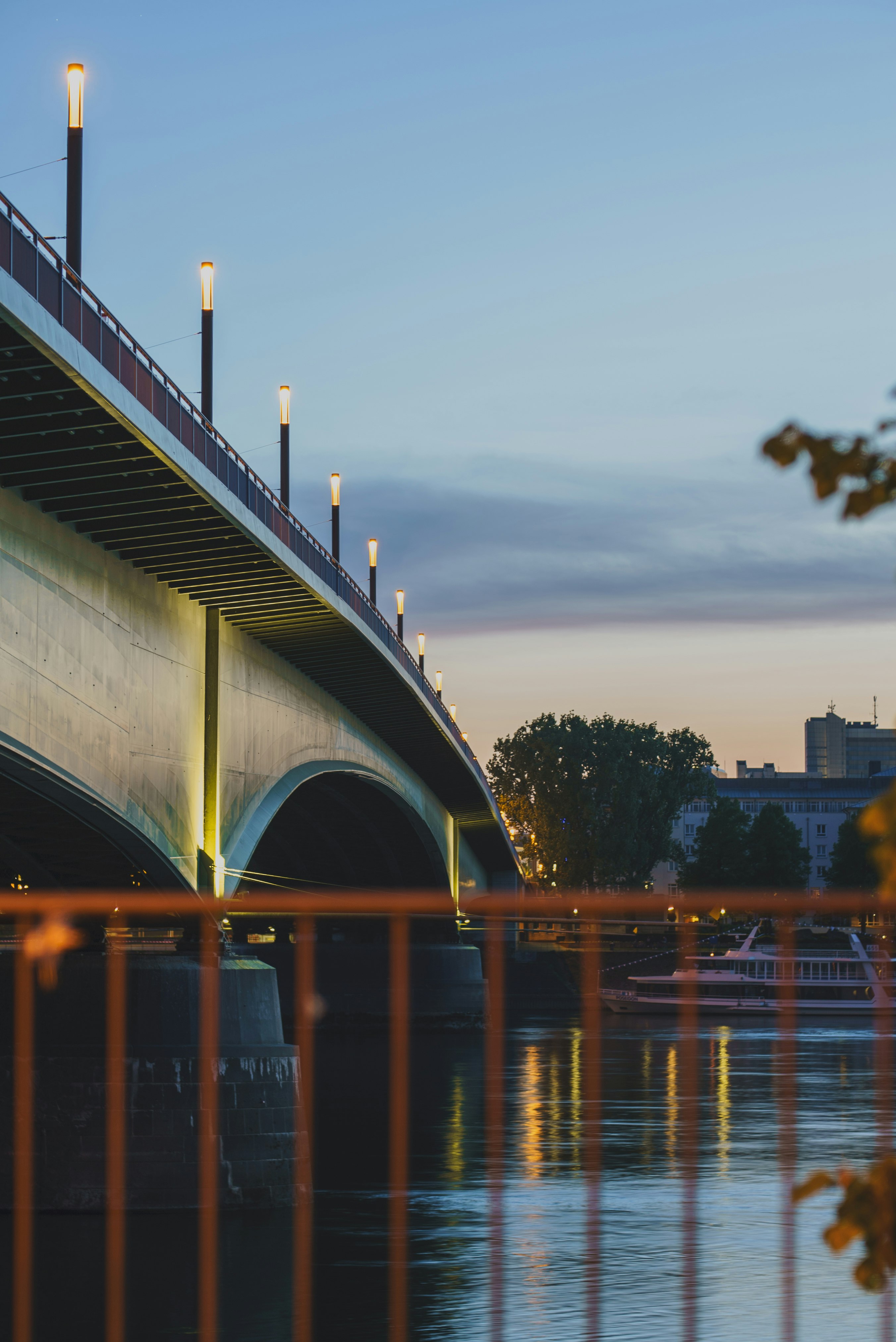 white and brown concrete bridge over river during daytime